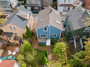 Single family home with blue siding in RI.