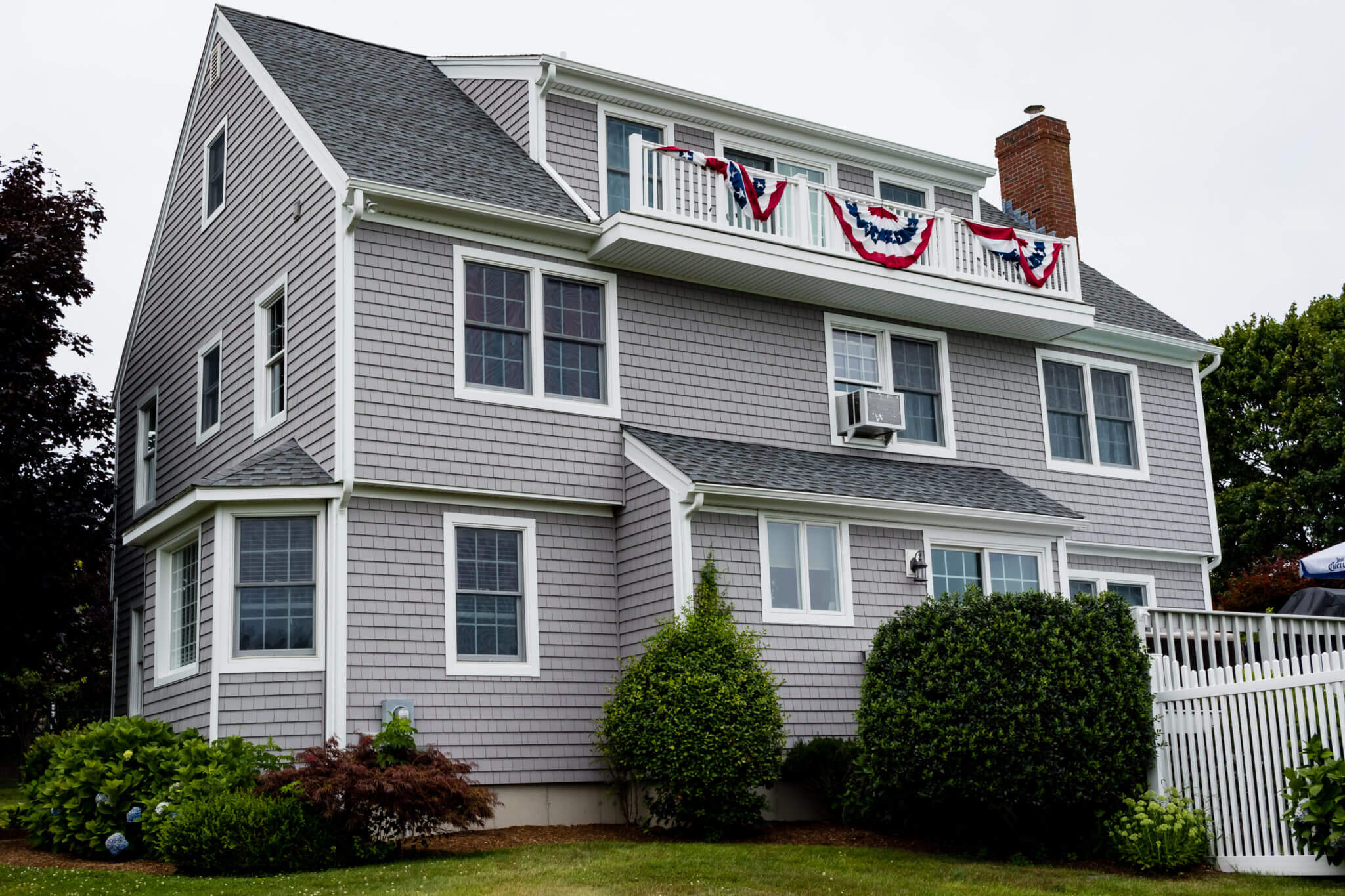 New vinyl siding installed by MA siding installers Marshall Building & Remodeling