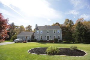 RI siding contractors, Marshall Building & Remodeling, remodeled this home with new vinyl siding