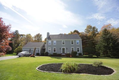 RI siding contractors, Marshall Building & Remodeling, remodeled this home with new vinyl siding