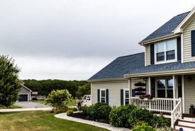 This MA home has new vinyl siding, roofing, & replacement windows