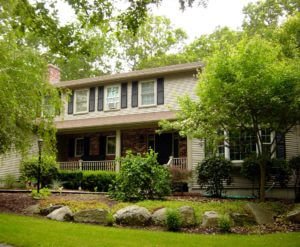 RI Home Exterior with Vinyl Siding and Brick