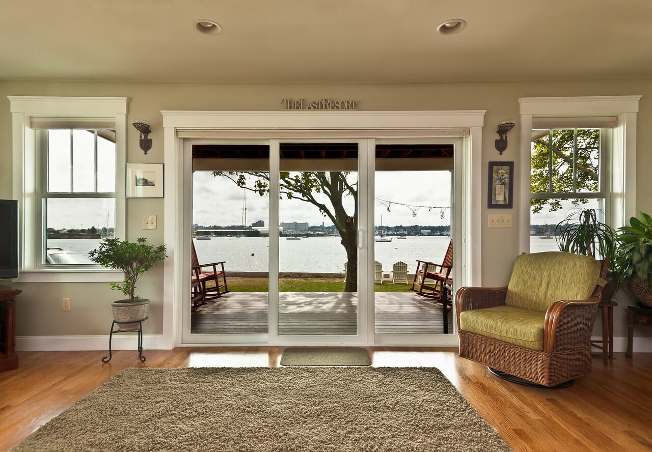 Large Sliding Glass Doors Installed on Waterfront RI Home by Marshall Building & Remodeling
