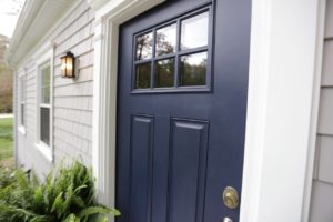 Cedar Impressions Siding and Door Trim Detail Installed Around Navy Blue Door on RI Home