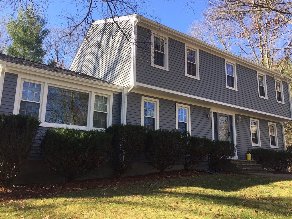 Gray Vinyl Siding and Window Installation on a Raised Ranch Home in MA