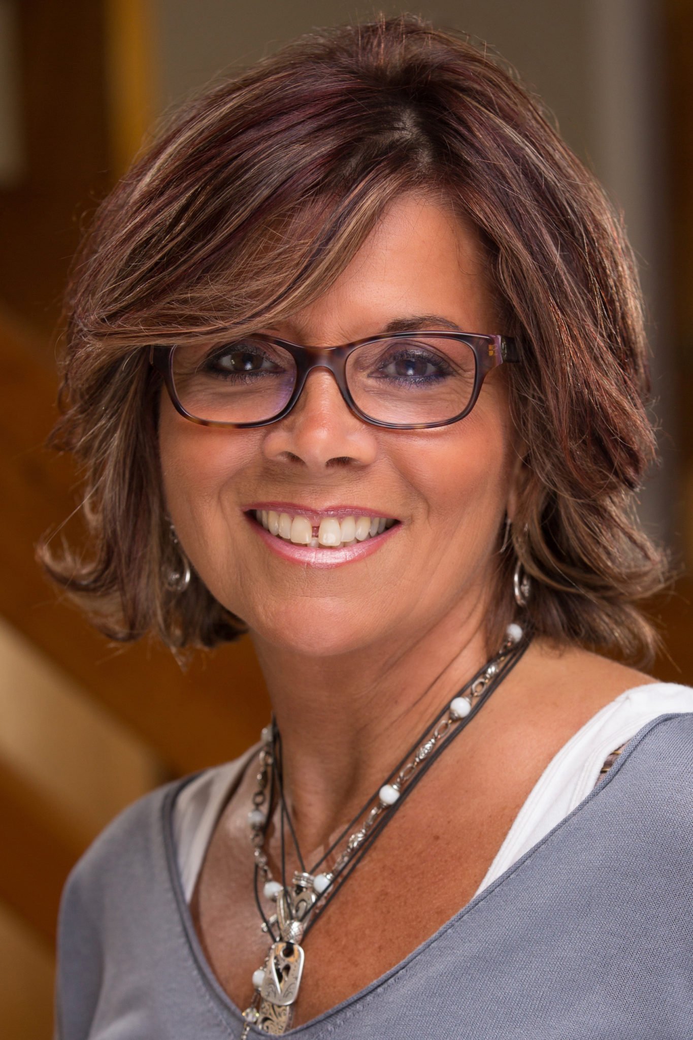 Judy Marshall-Bettencourt helps homeowners with roofing, siding, & replacement windows
