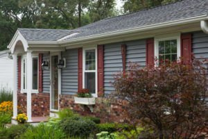 Blue Clapboard Siding with Maroon Shutters Installed on a Massachusetts Home by Marshall Building & Remodeling