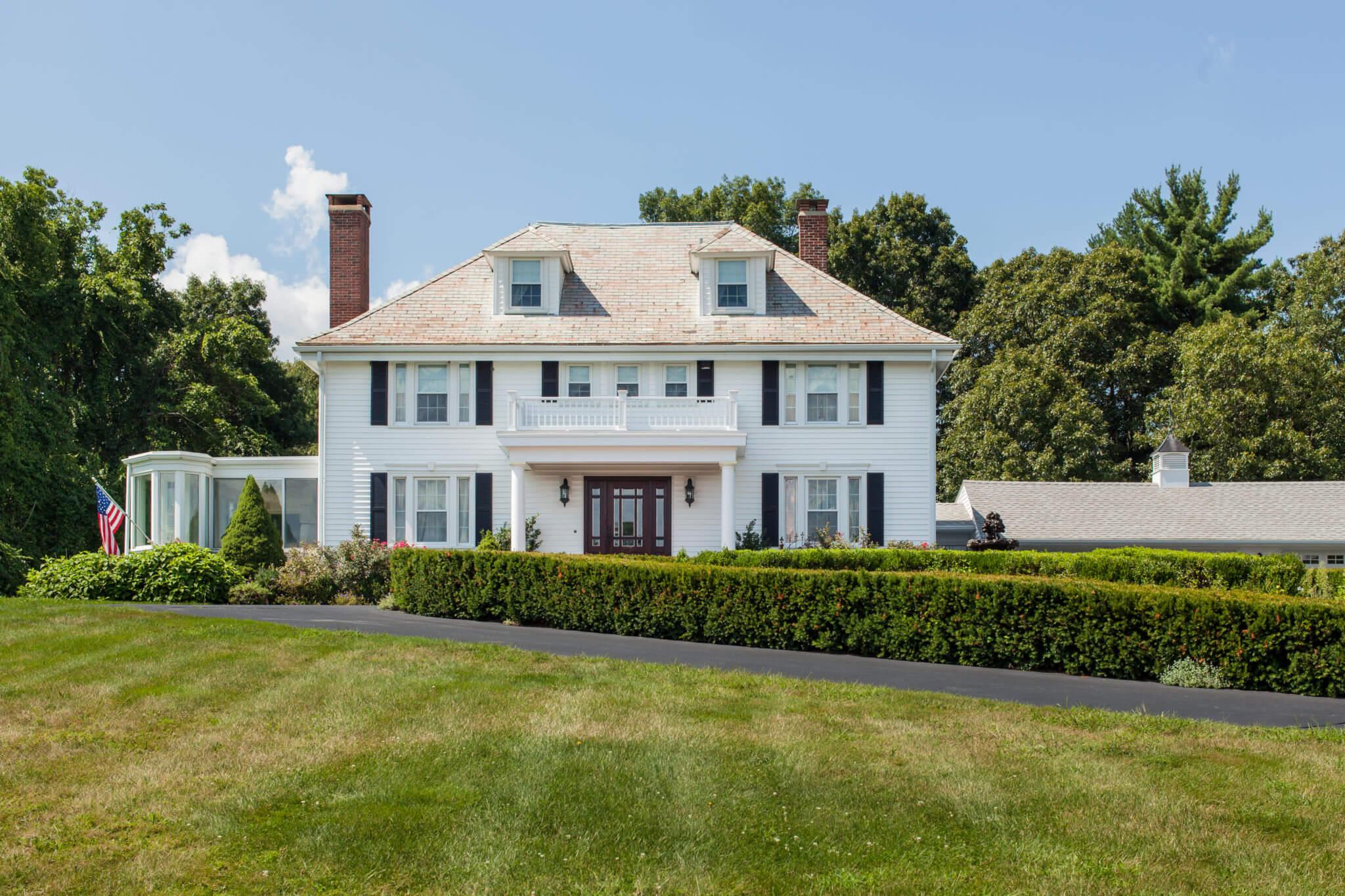 White Siding and Windows Installed on Rhode Island home by Marshall Building & Remodeling