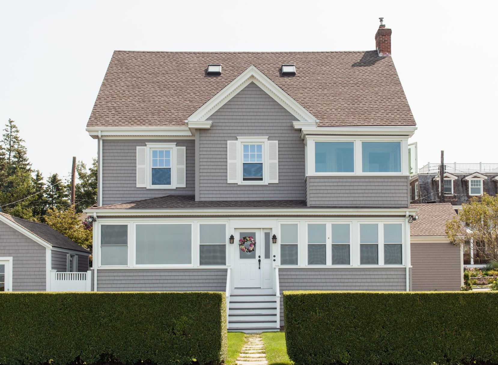 RI Home with Newly Renovated Roofing, Siding, and Windows Installed by Contractors Marshall Building & Remodeling