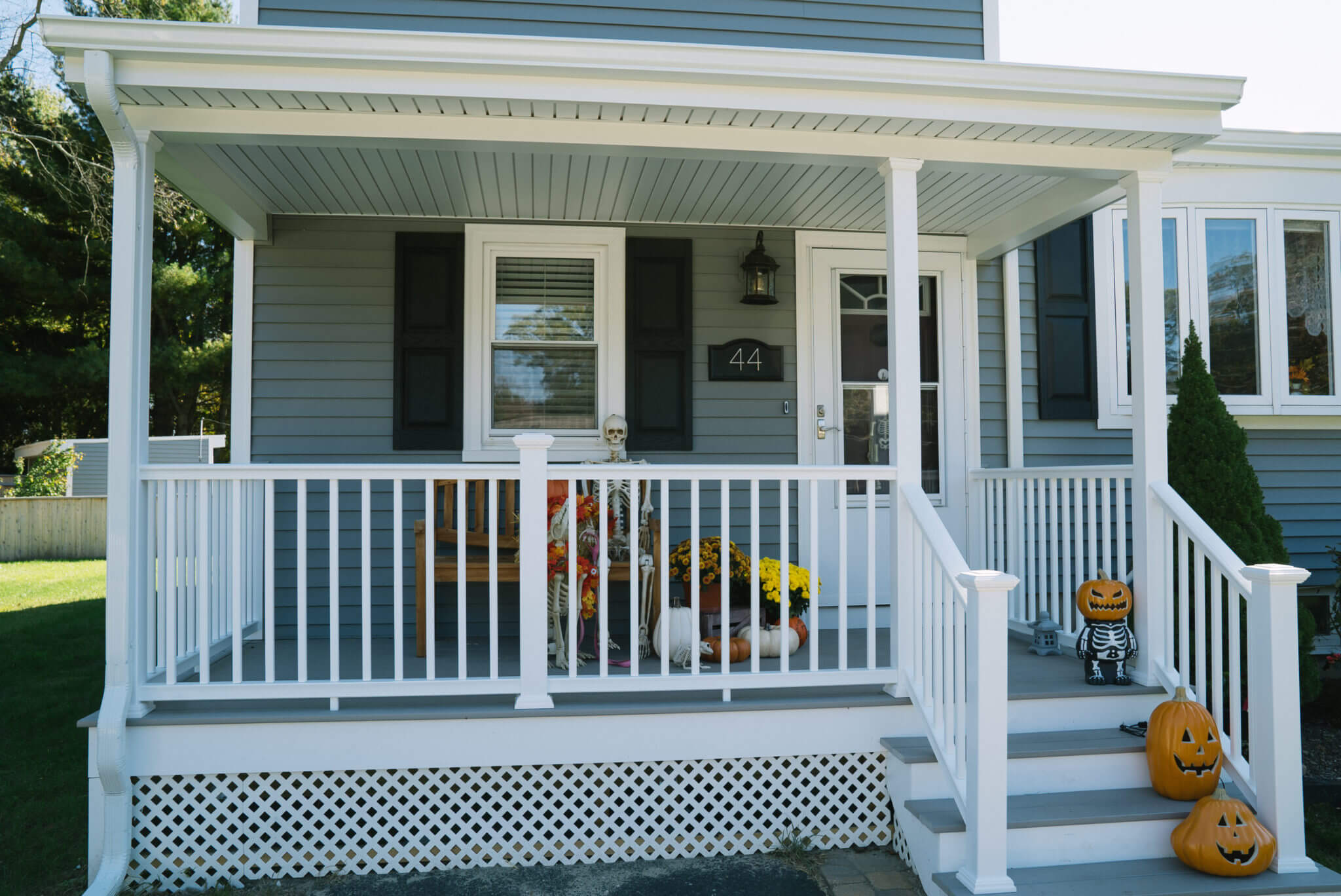 Remodeled RI Home Exterior with Mystic Ovation Clapboard Siding, New Windows, and Porch