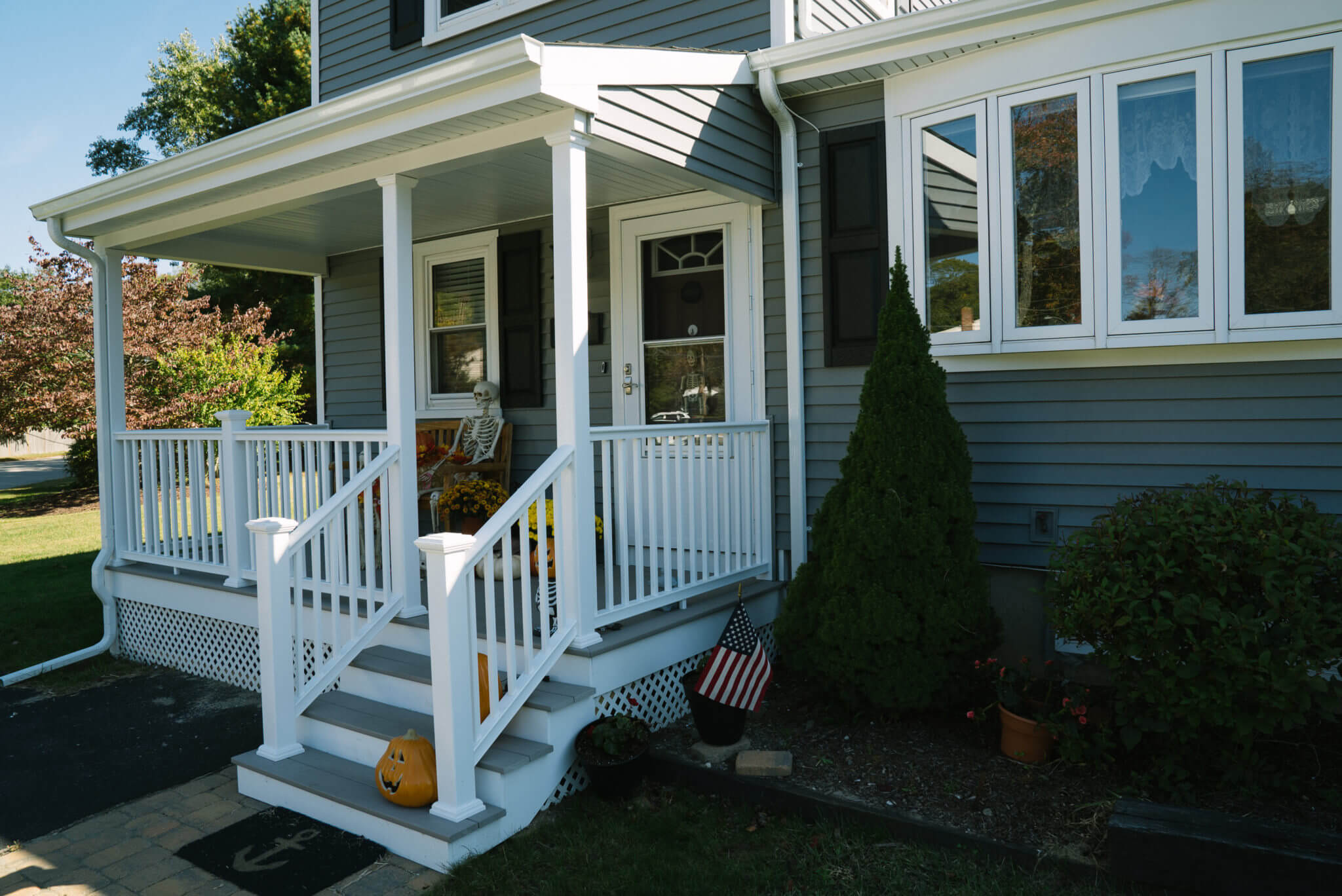 Mastic Ovation Clapboard Siding Installed on RI Home with New Windows and Porch