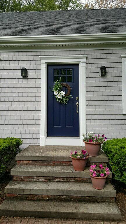 Cedar Impressions Siding and Door Trim Detail Around Beautiful Blue Door in Massachusetts