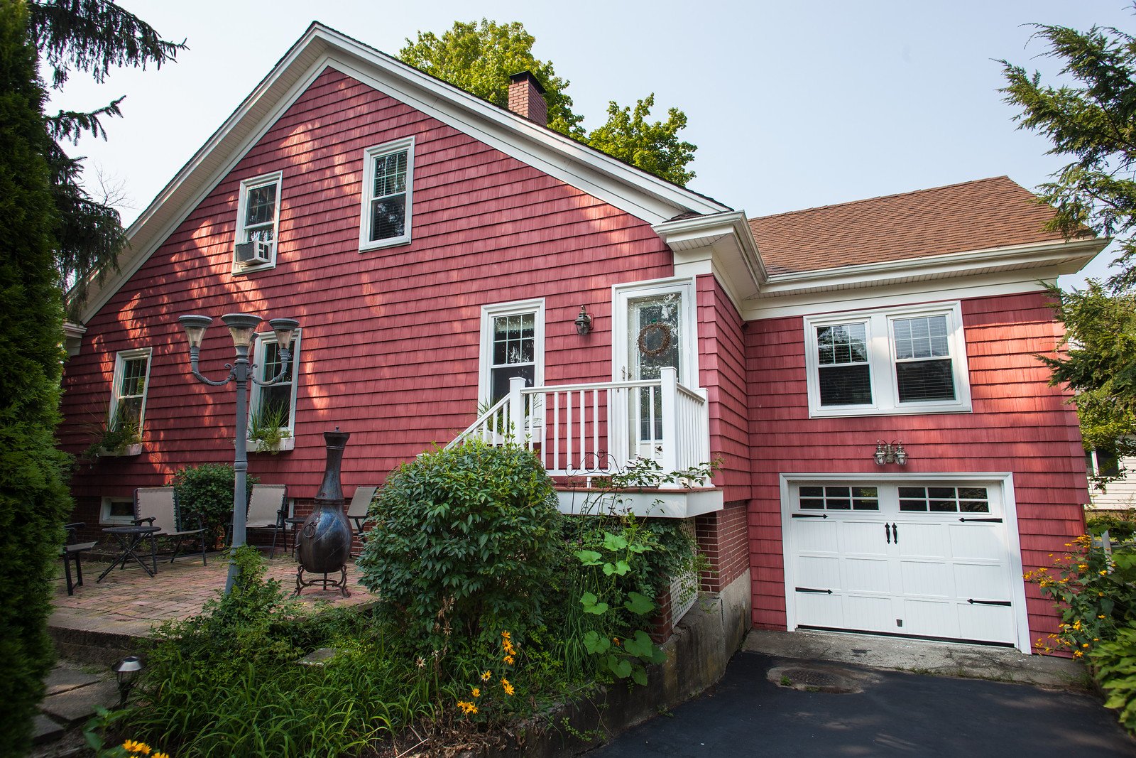 Barn Red Vinyl Siding on Barrington Home