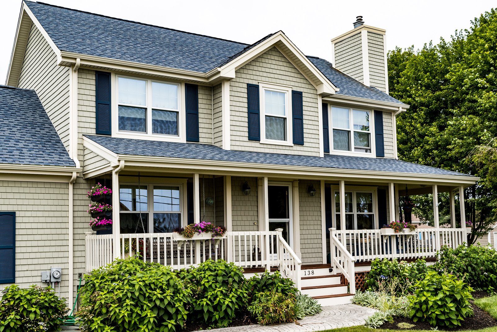 Vinyl siding, replacement roof, & windows in MA by Marshall Building & Remodeling