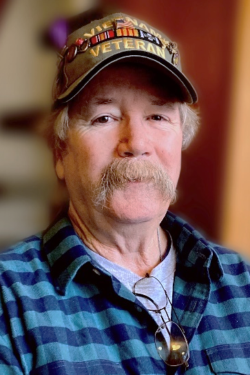 Kerwin Doherty from roofing, siding, & replacement window contractor Marshall Building & Remodeling