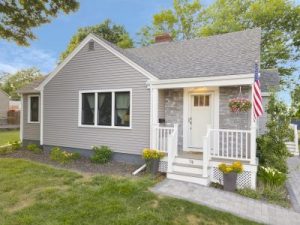 House with gray siding and white trim